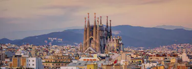 A cityscape of Barcelona in Spain featuring iconic elements of Barcelona's architectural landmarks.