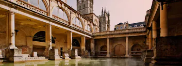 A cityscape of Bath in the UK featuring iconic elements of Bath's architectural landmarks.