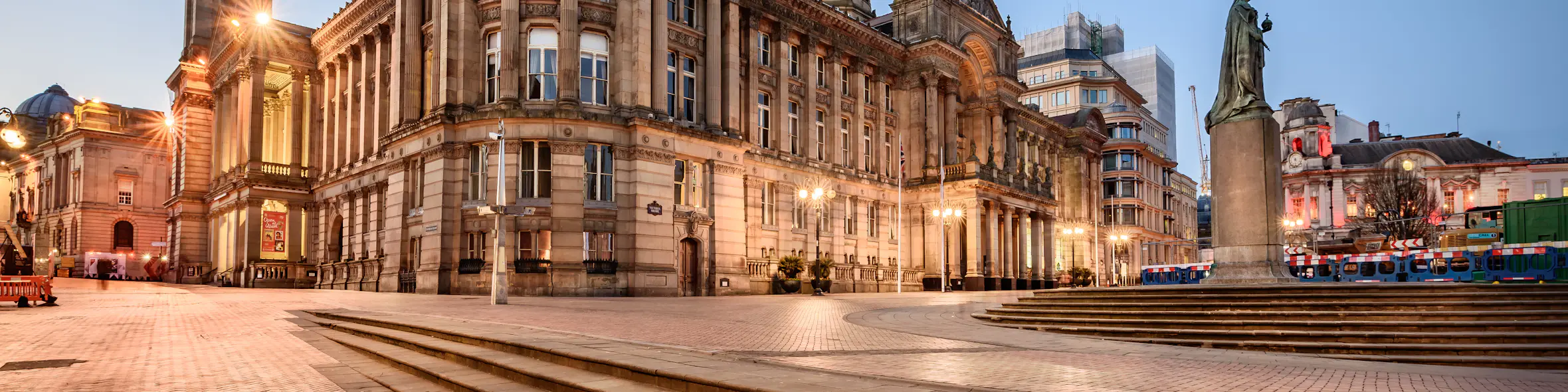 A cityscape of Birmingham in the UK featuring iconic elements of Birmingham's architectural landmarks.