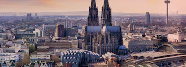 A cityscape of Köln in Germany featuring iconic elements of Köln's architectural landmarks.