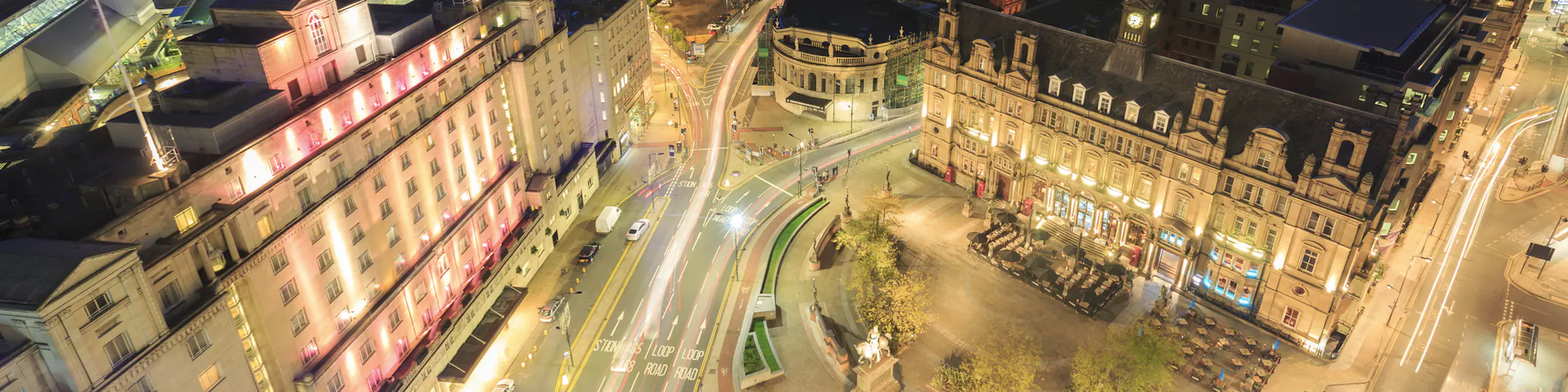 A cityscape of Leeds in the UK featuring iconic elements of Leeds's architectural landmarks.