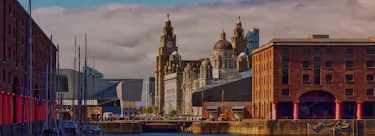 A cityscape of Liverpool in the UK featuring iconic elements of Liverpool's architectural landmarks.