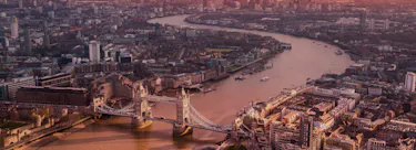 A cityscape of London in the UK featuring iconic elements of London's architectural landmarks.
