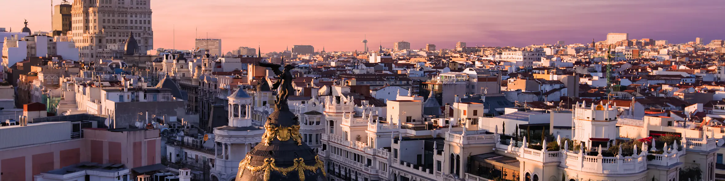 A cityscape of Madrid in Spain featuring iconic elements of Madrid's architectural landmarks.