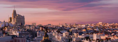 A cityscape of Madrid in Spain featuring iconic elements of Madrid's architectural landmarks.