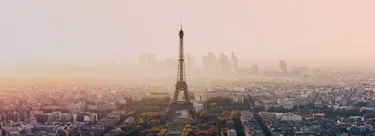 A cityscape of Paris in France featuring iconic elements of Paris's architectural landmarks.