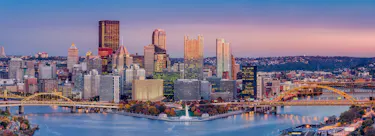 A cityscape of Pittsburgh, Pennsylvania in the USA featuring iconic elements of Pittsburgh, Pennsylvania's architectural landmarks.