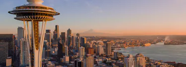 A cityscape of Seattle, Washington in the USA featuring iconic elements of Seattle, Washington's architectural landmarks.