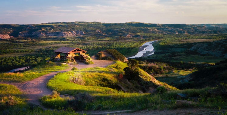 grassy hills with a river in North Dakota