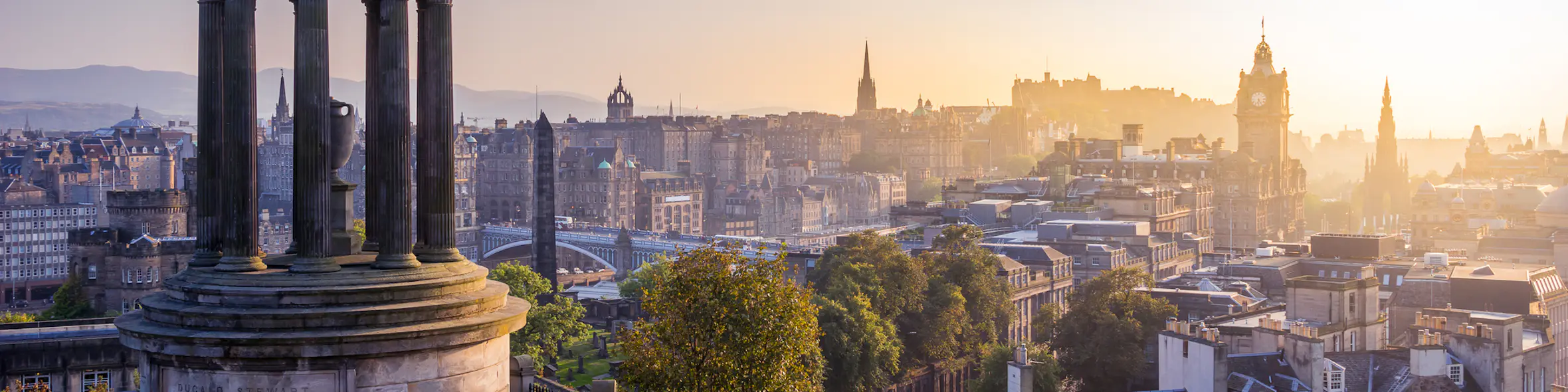 A famous cityscape or landscape of Scotland featuring iconic elements of Scotland's natural beauty or architectural landmarks.