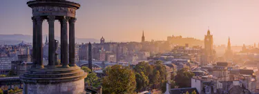 A famous cityscape or landscape of Scotland featuring iconic elements of Scotland's natural beauty or architectural landmarks.