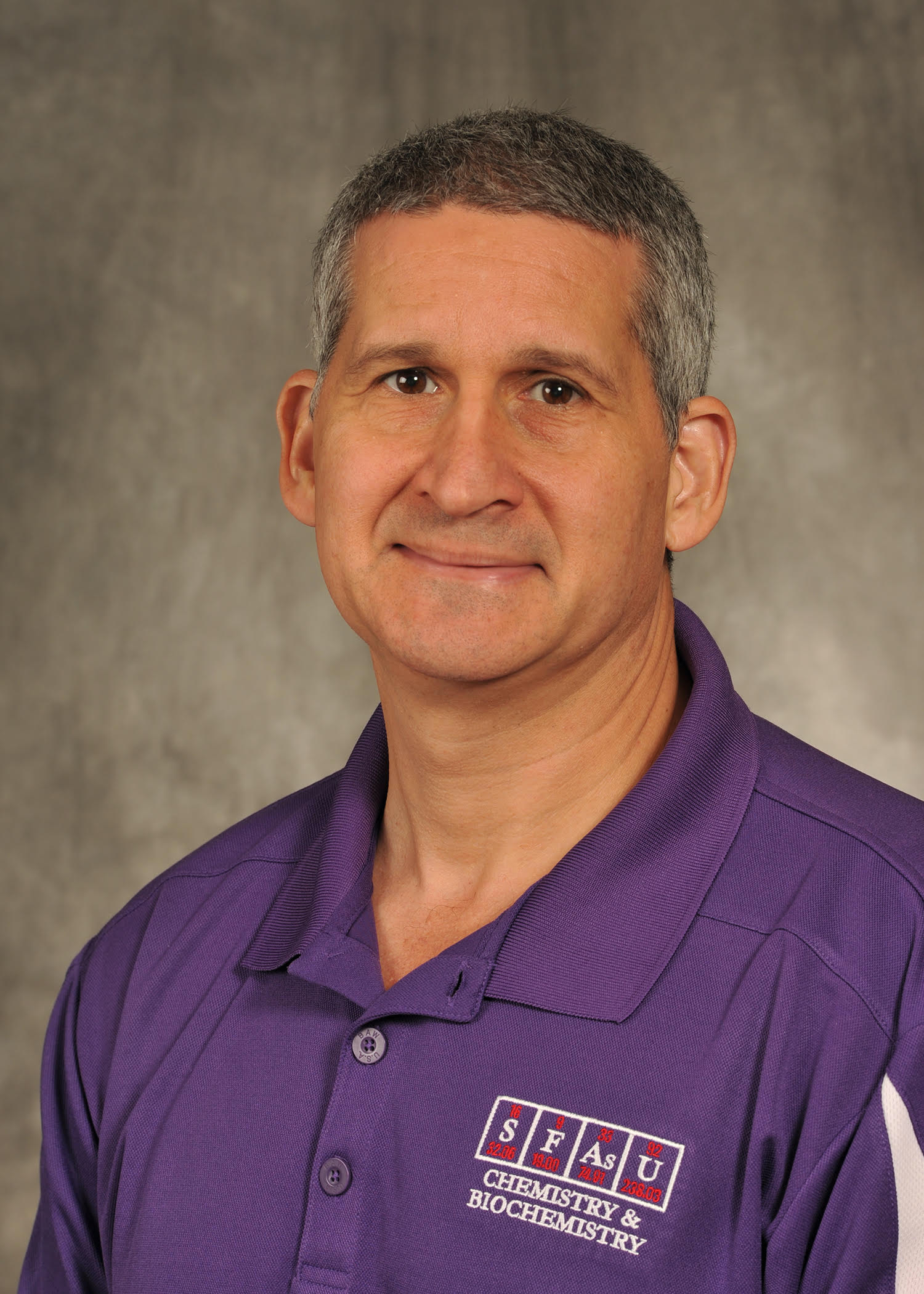 Headshot of Dr Michael Janusa